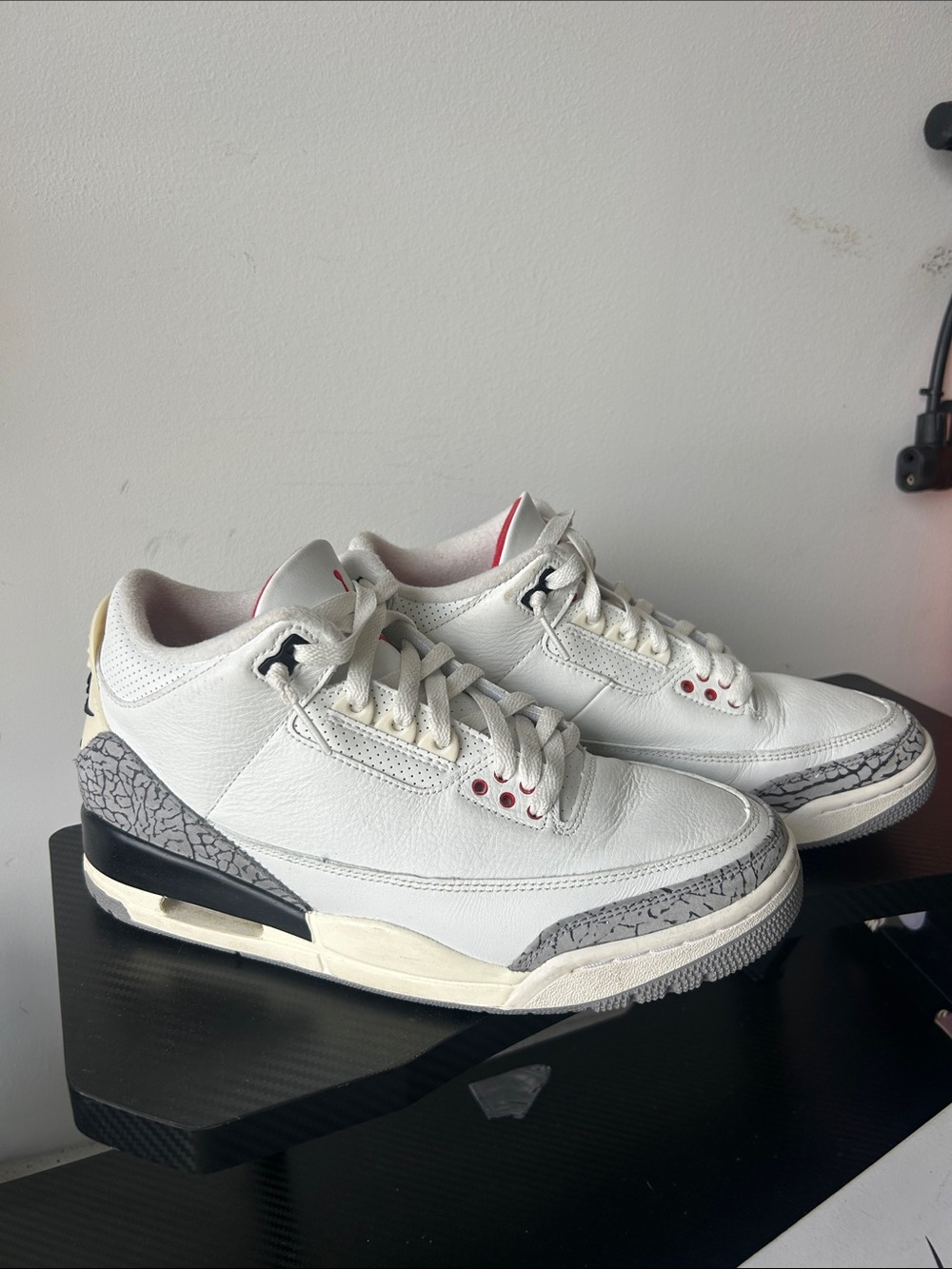 Jordan Men’s White Leather Sneakers with Gray Elephant Print and Red Accents